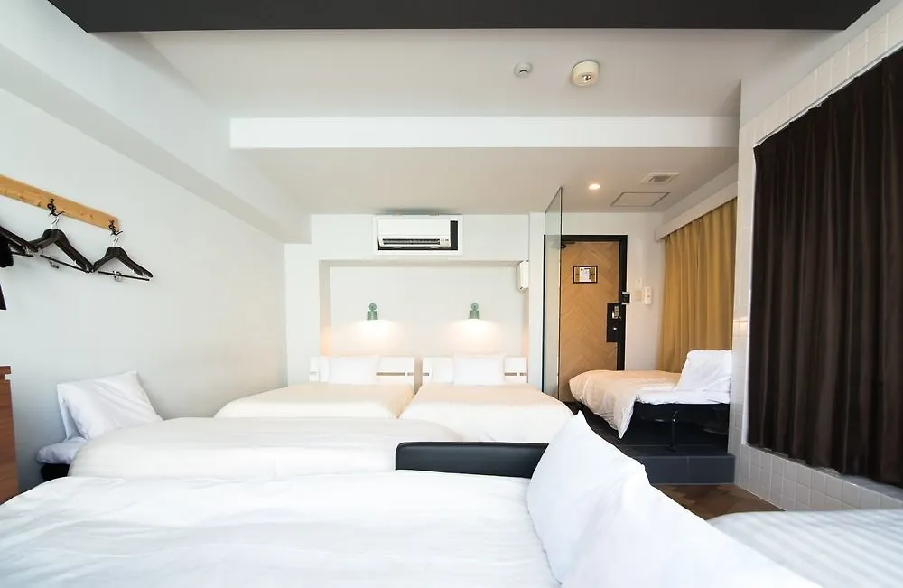 Szálloda The Rooms Oszaka